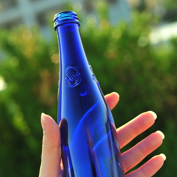 Exquisite Cobalt Blue Water Glass Bottle with Floral 3D Artwork - Picture 1 of 14